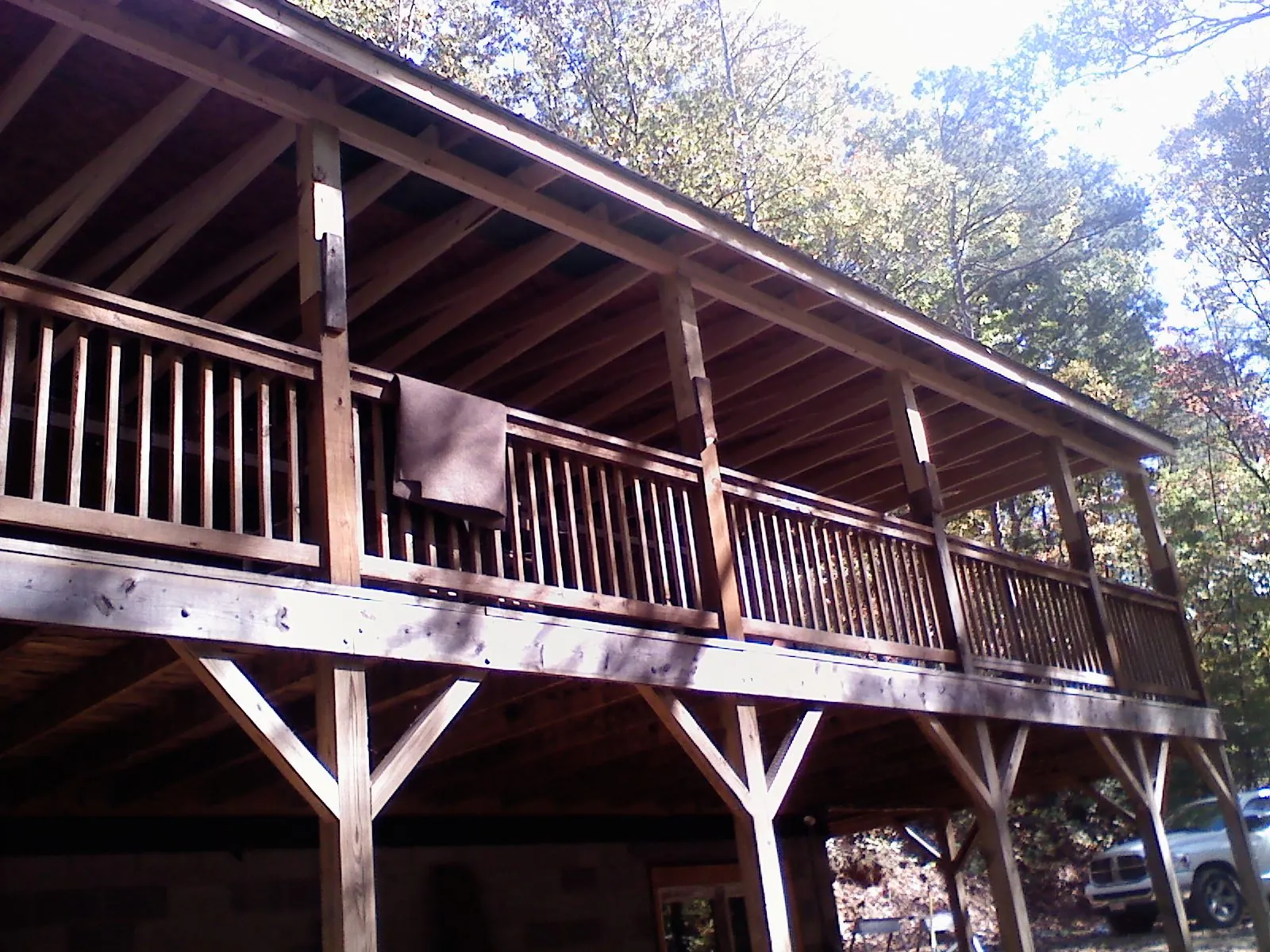 Timber framing under a new elevated porch and deck — Roof Leak Repair in Lane by Roofing Brothers